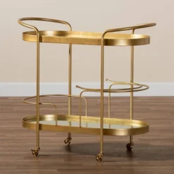 Kamal Glam Brushed Metal And Mirrored Glass 2 Tier Mobile Wine Bar Cart Gold - Baxton Studio -Furniture Sale Store GUEST 40b5e7e2 276a 488e b7c0 49b925689803